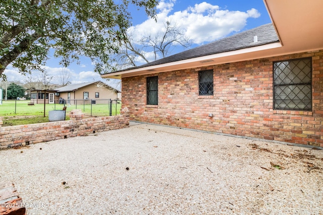 rear view of house with a patio