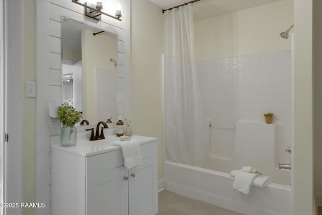 full bathroom featuring shower / bath combination with curtain and vanity