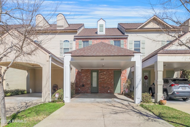 multi unit property featuring a carport