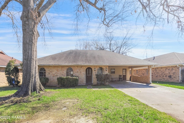 ranch-style house with a carport and a front yard