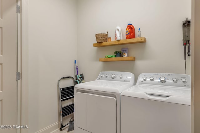 clothes washing area with laundry area and washing machine and clothes dryer