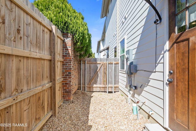 view of side of property with fence