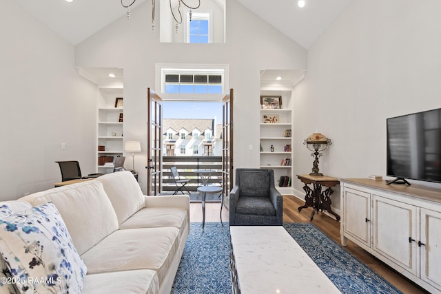 living area with dark wood-style floors, built in features, recessed lighting, high vaulted ceiling, and baseboards