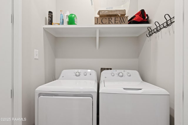 laundry area featuring laundry area and independent washer and dryer