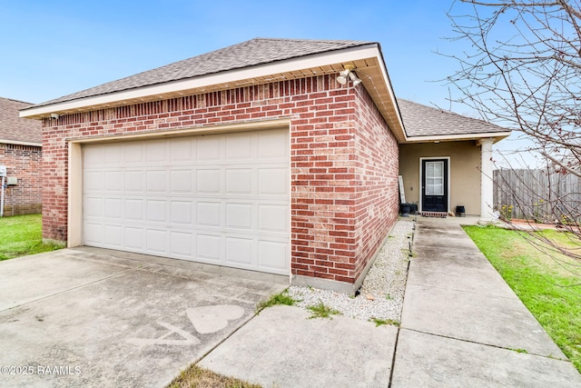 single story home with driveway, a garage, stucco siding, roof with shingles, and brick siding