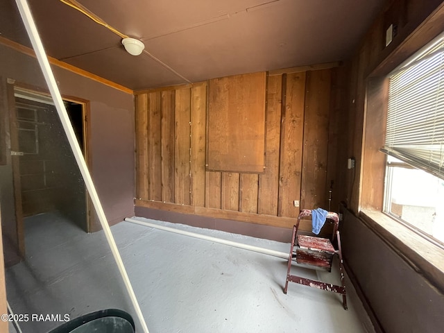 183 Midway Exit Dr, Opelousas, LA 70570 - miscellaneous room with concrete floors and wooden walls