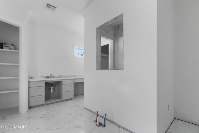 interior space featuring gray cabinetry