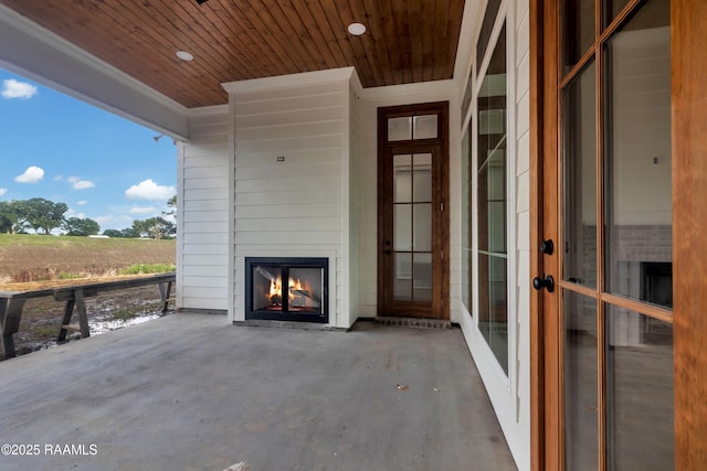 134 Cypress Bend Rd, Scott, LA 70583 - view of patio / terrace with a large fireplace and a view of countryside