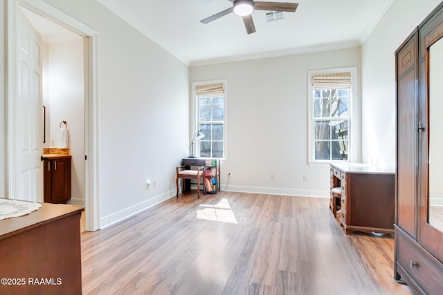 unfurnished bedroom with light wood-style floors, multiple windows, and ornamental molding