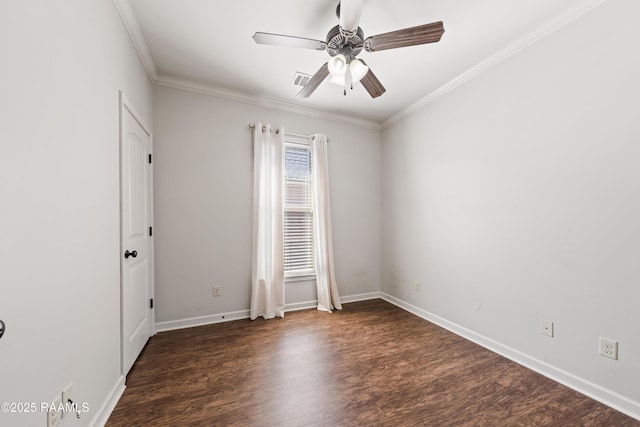 empty room with crown molding, baseboards, ceiling fan, and wood finished floors