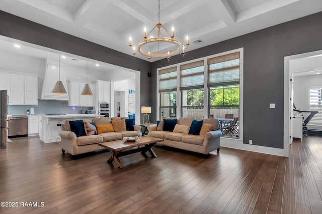 living room with coffered ceiling, a notable chandelier, visible vents, and recessed lighting