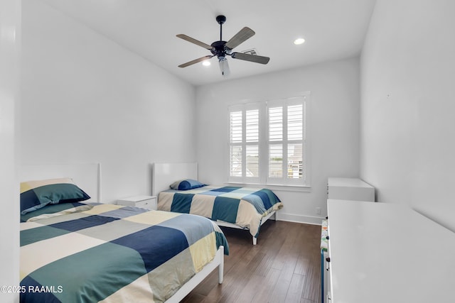 bedroom featuring ceiling fan, baseboards, wood finished floors, and recessed lighting