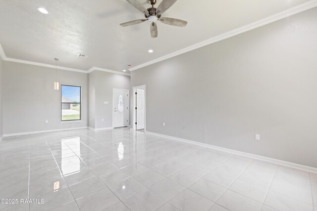 spare room featuring a ceiling fan, baseboards, crown molding, and recessed lighting