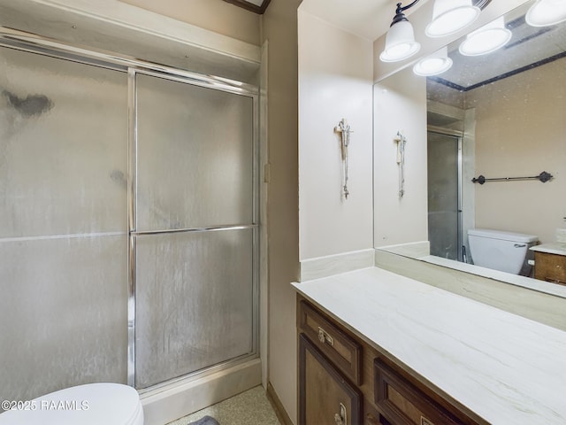 full bath with toilet, a shower with shower door, and vanity