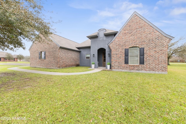 1007 Stephanie Dr, Exd, Breaux Bridge, LA 70517 - view of front of house with a front lawn and brick siding