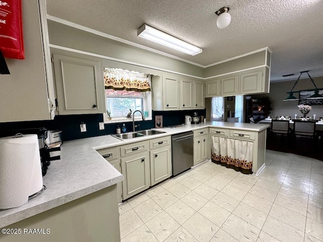 kitchen with dishwashing machine, a peninsula, light countertops, a textured ceiling, and a sink