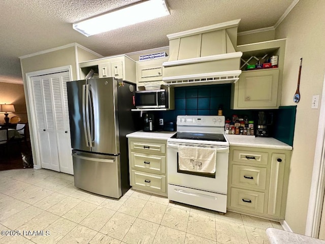 kitchen featuring crown molding, custom exhaust hood, stainless steel appliances, and light countertops