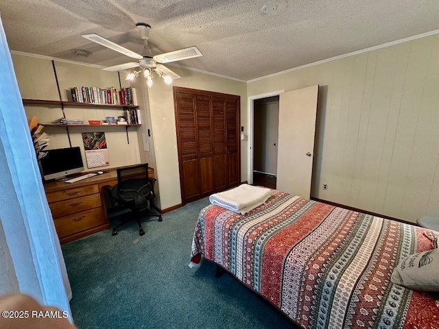 bedroom with a textured ceiling, carpet floors, a ceiling fan, a closet, and crown molding