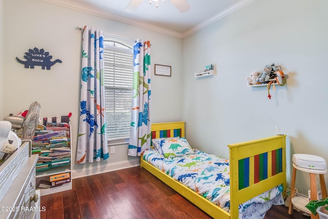 bedroom featuring crown molding, baseboards, ceiling fan, and dark wood-type flooring