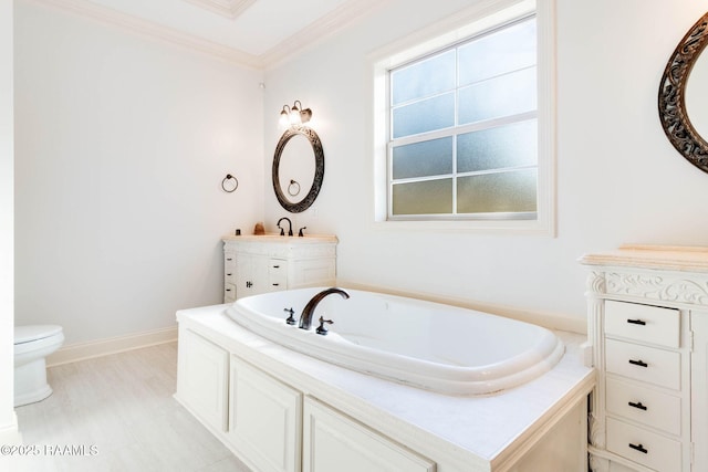 full bath featuring baseboards, toilet, crown molding, vanity, and a bath