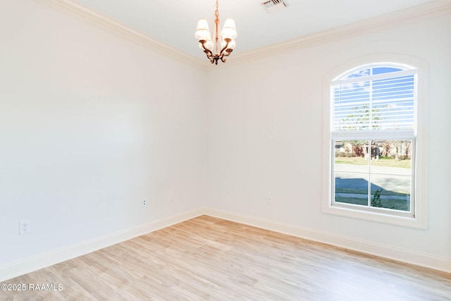 unfurnished room featuring baseboards, visible vents, light wood-style flooring, crown molding, and a notable chandelier