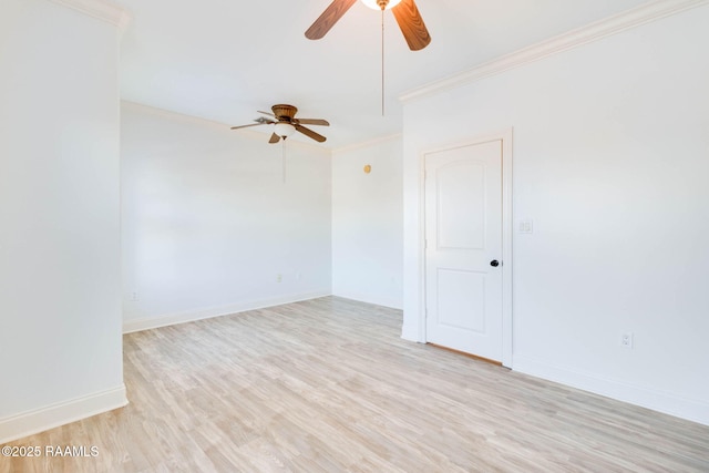 empty room with light wood-style floors, crown molding, baseboards, and ceiling fan