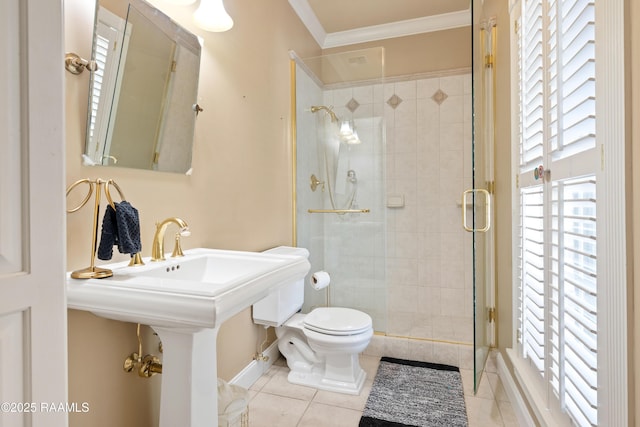 full bathroom featuring toilet, a shower stall, ornamental molding, and tile patterned floors