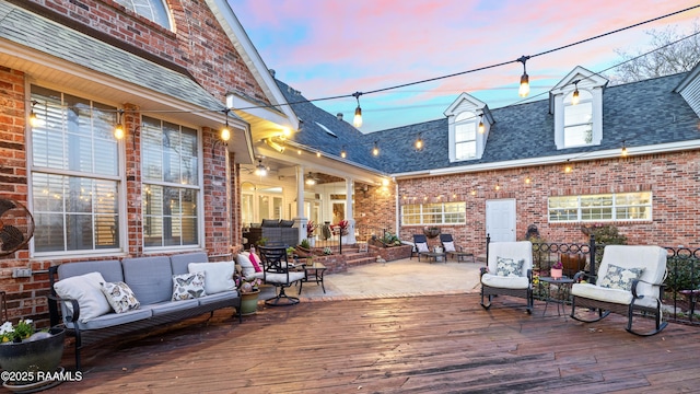 wooden deck featuring outdoor lounge area