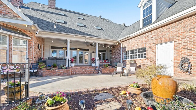 view of patio / terrace featuring french doors and ceiling fan