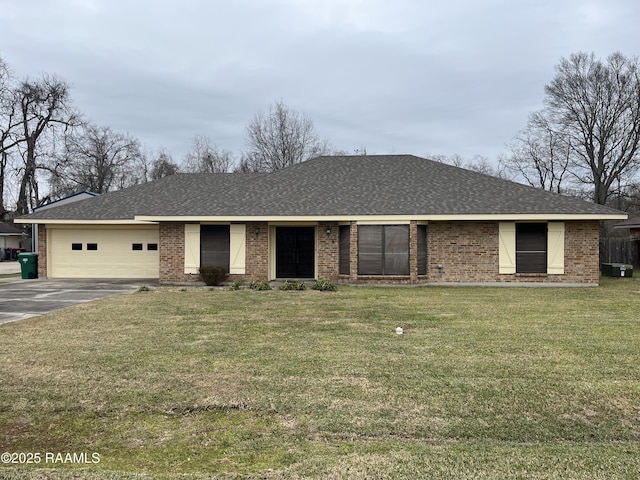 single story home featuring a garage, brick siding, driveway, and a front lawn