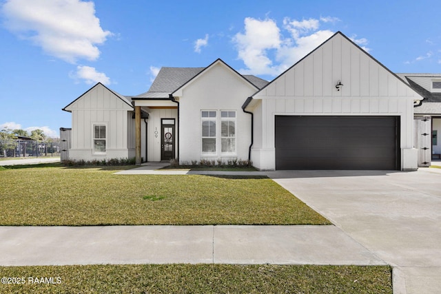 modern farmhouse with a shingled roof, board and batten siding, a garage, driveway, and a front lawn