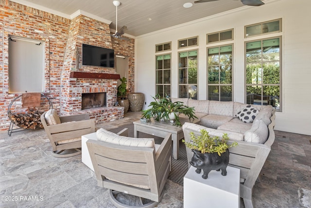 view of patio / terrace with an outdoor living space with a fireplace