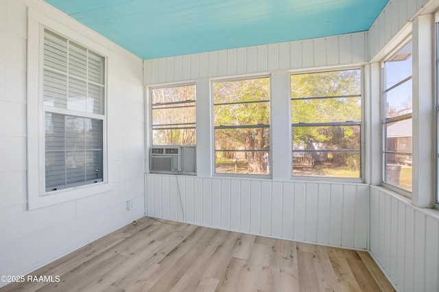 404 Senior Aly, Abbeville, LA 70510 - unfurnished sunroom featuring a wealth of natural light and cooling unit
