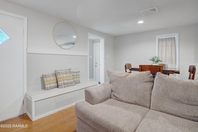 404 Senior Aly, Abbeville, LA 70510 - living room featuring light wood-type flooring, visible vents, baseboards, and recessed lighting
