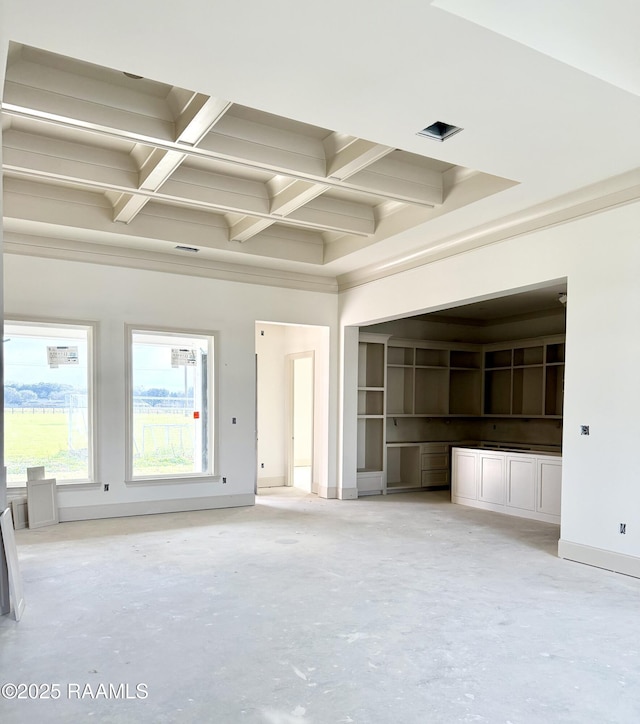 unfurnished living room featuring beamed ceiling, concrete floors, coffered ceiling, and baseboards