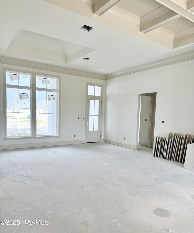 unfurnished room with ornamental molding, unfinished concrete floors, a raised ceiling, and baseboards