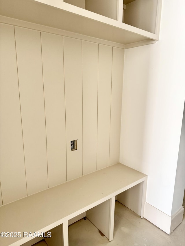 mudroom featuring concrete flooring