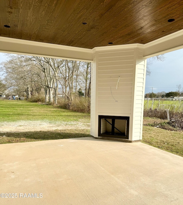 view of patio / terrace featuring exterior fireplace