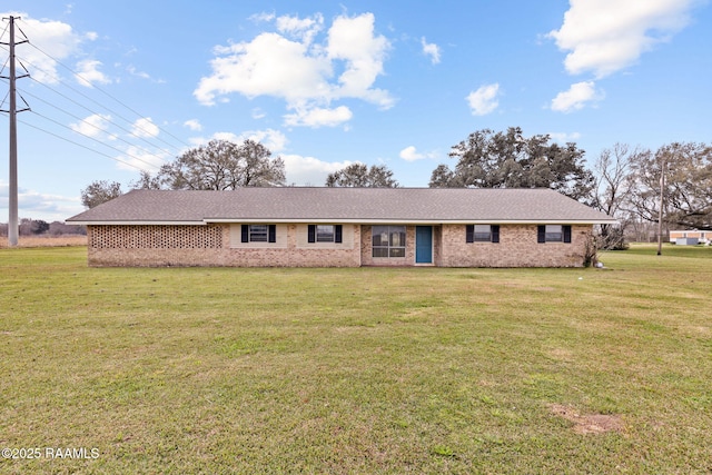 single story home with a front lawn and brick siding