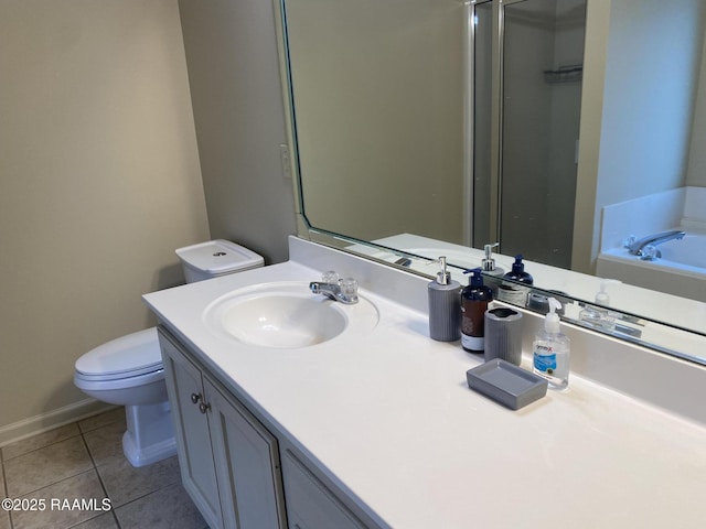 513 Lodge Dr, Lafayette, LA 70506 - full bath featuring tile patterned floors, vanity, a bath, and an enclosed shower