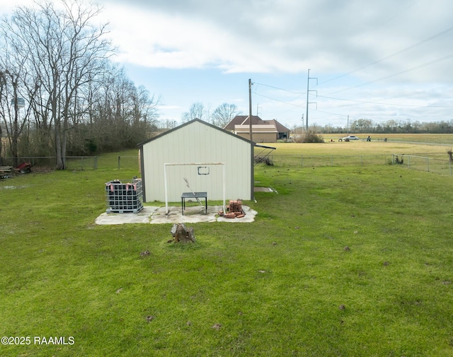 view of outbuilding featuring an outbuilding and fence