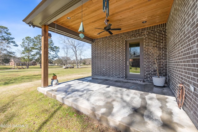 view of patio featuring ceiling fan