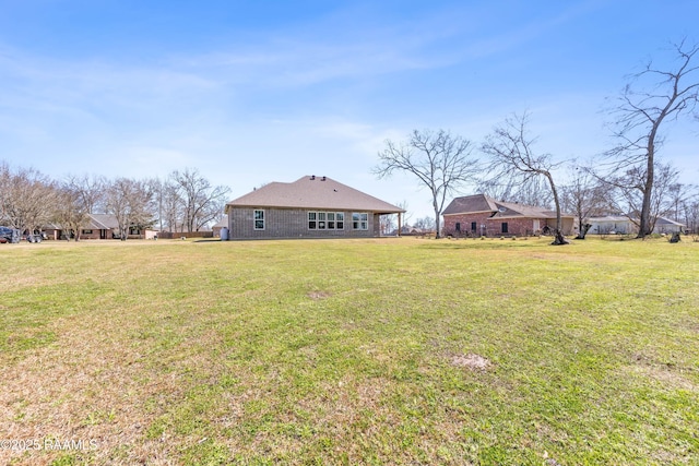 view of yard featuring a residential view