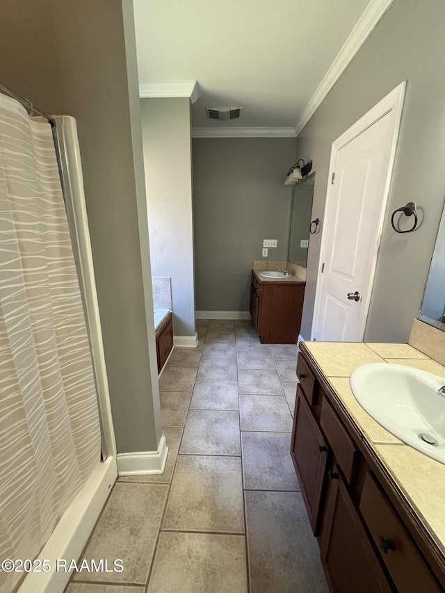 full bathroom featuring visible vents, two vanities, a sink, and ornamental molding