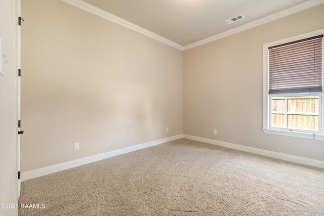 unfurnished room featuring baseboards, visible vents, carpet flooring, and ornamental molding