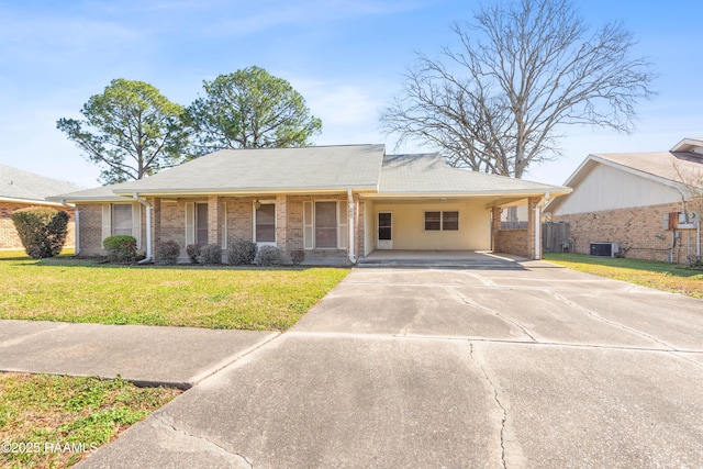 ranch-style home with driveway, a front yard, central AC, a carport, and brick siding