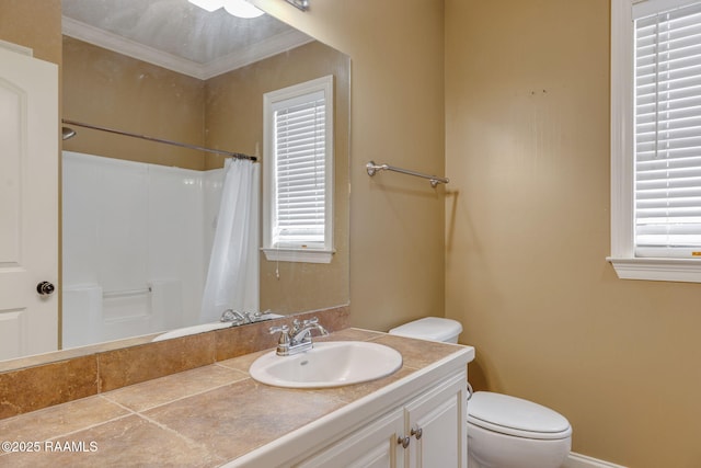 full bathroom with a shower with shower curtain, vanity, toilet, and a healthy amount of sunlight