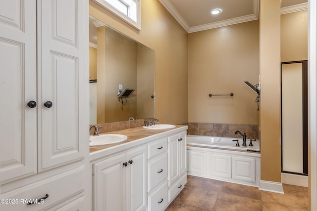 full bathroom featuring ornamental molding, a sink, a shower stall, and a bath