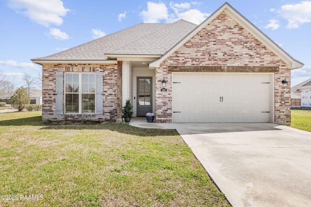 view of front facade featuring brick siding, an attached garage, driveway, and a front lawn