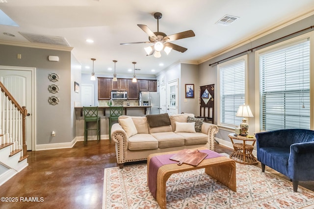 living room with finished concrete flooring, stairway, baseboards, and visible vents